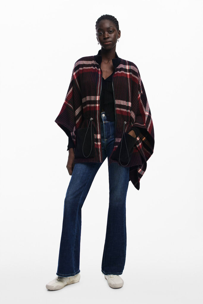 Poncho Checks Aldama